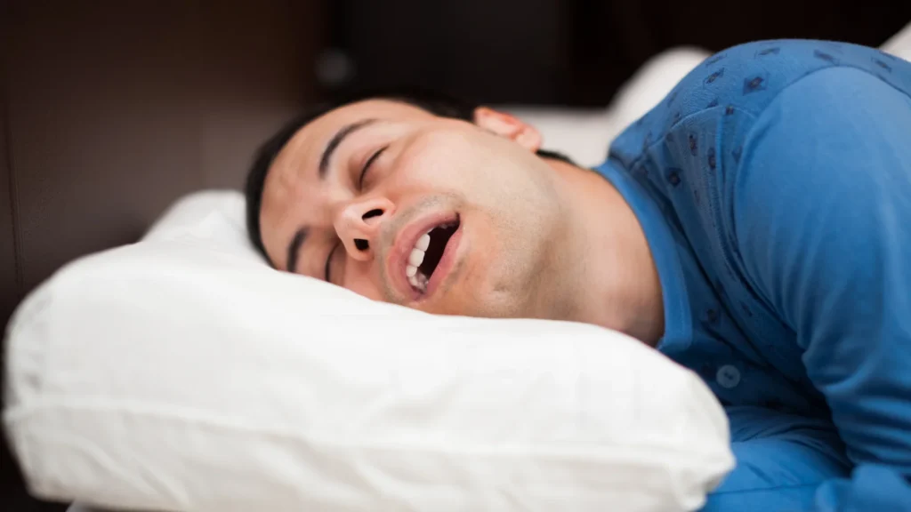 A man using the Best Snoring Pillow