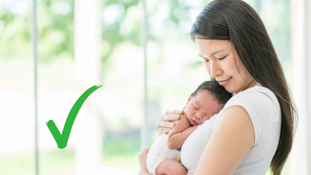 Best Sleeping Position for Baby with Stuffy Nose - Upright Holding (for naps)